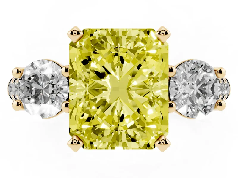 Fancy Yellow Three-Stone Radiant Cut Diamond Pavé Band Ring Set in Yellow gold with Prong-Set Trio