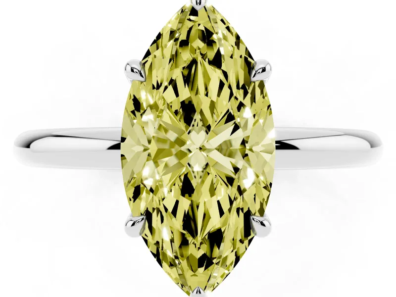 Fancy Yellow Marquise Cut Diamond Solitaire Ring Set in White gold with Thin Band and Prong Setting