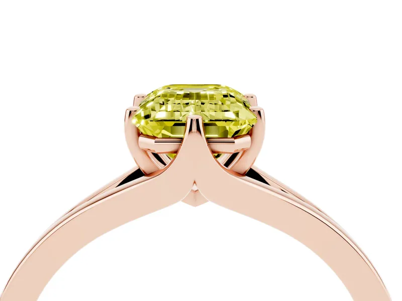 Fancy Yellow Emerald Cut Diamond Solitaire Ring Set in Rose gold with Polished Tapered Band and Prong Setting