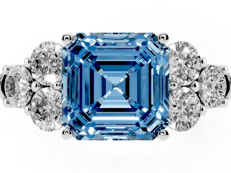 Fancy Blue Asscher Cut Diamond Cluster Ring Set in Silver with Round Accent Stones and Prong Setting on a Plain Band