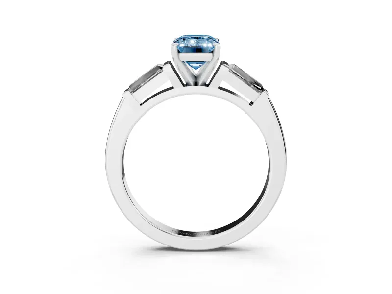 Fancy Blue Emerald Cut Diamond Solitaire Ring Set in White gold with Tapered Baguette Side Stones and Prong Setting