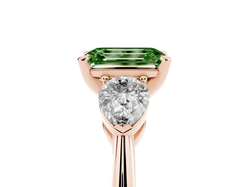 Fancy Green Three-Stone Emerald Cut Diamond Ring Set in Rose gold with Pear Side Stones and Prong Setting