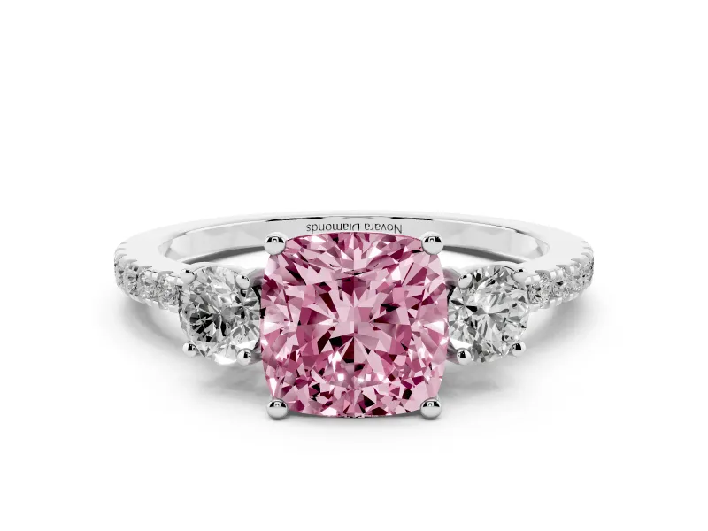 Fancy Pink Cushion Cut Diamond Three-Stone Ring Set in Platinum with Pavé Band and Graduated Sides