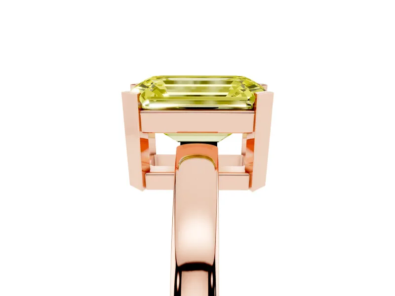 Fancy Yellow Emerald Cut Diamond Solitaire Ring Set in Rose gold with Prong Head and Smooth Polished Band