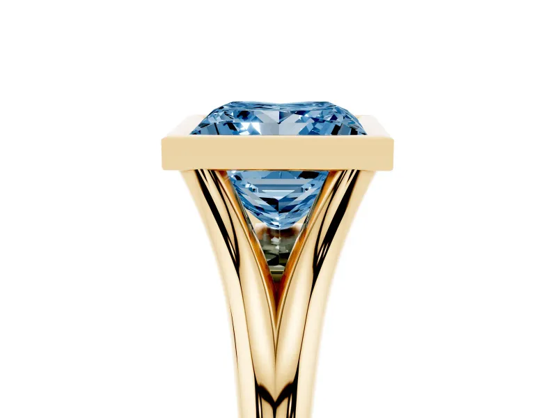 Fancy Blue Bezel Set Princess Cut Diamond Solitaire Ring Set in Yellow gold with Tapered Band