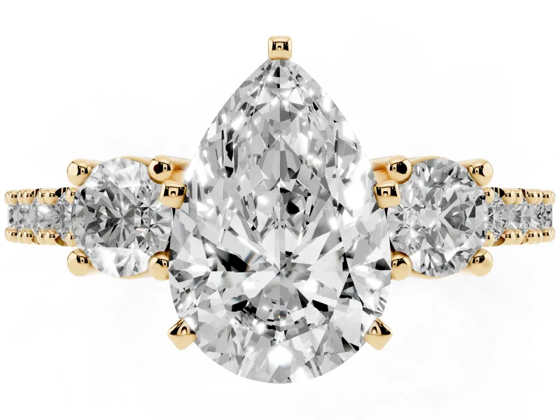 Three-Stone Pear Cut Diamond Pavé Band Ring Set in Yellow gold with Prong Setting