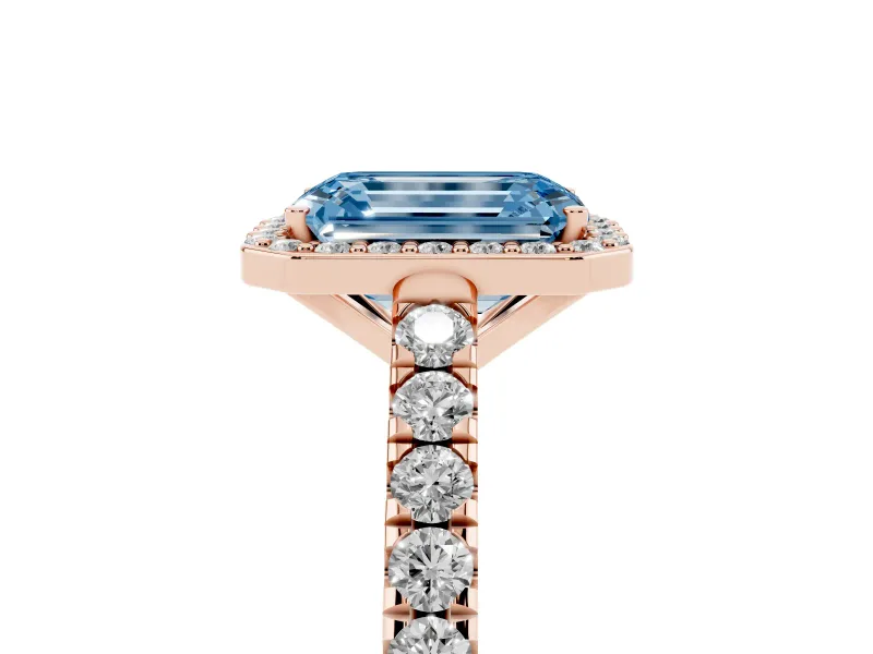 Fancy Blue Emerald Cut Diamond Halo Engagement Ring Set in Rose gold with Pavé Band and Prong Setting