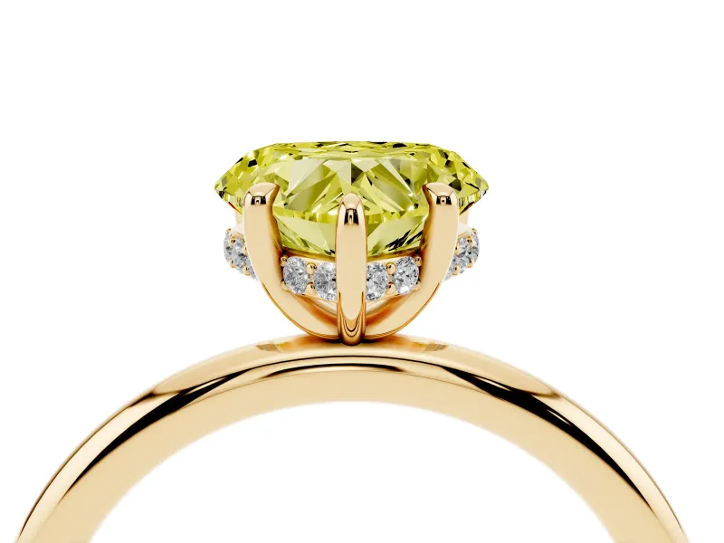Fancy Yellow Heart Cut Diamond Solitaire Ring Set in Yellow gold with Thin Band and Prong Setting