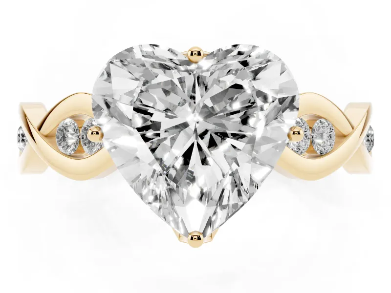 Heart Cut Diamond Twist Band Solitaire Ring Set in Yellow gold with Leaf Prong Setting and Accent Stones