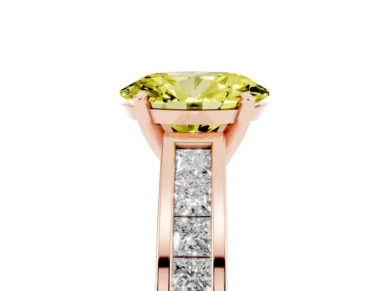 Fancy Yellow Oval Cut Diamond Solitaire Ring Set in Rose gold with Channel-Set Band and Prong Setting