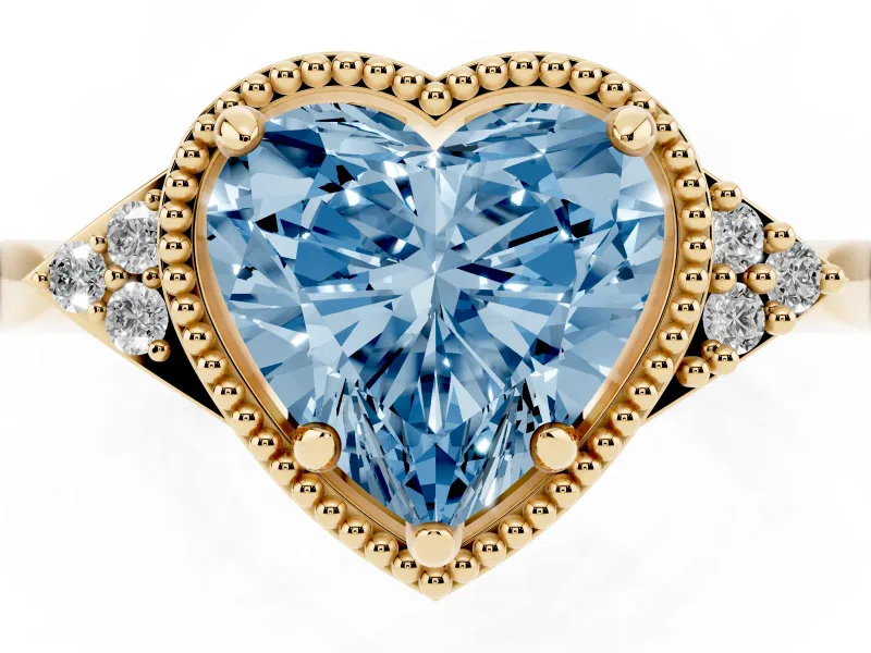 Fancy Blue Heart Cut Diamond Milgrain Solitaire Ring Set in Yellow gold with Tapered Pavé Band and Prong Setting