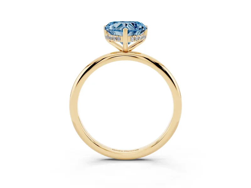 Fancy Blue Heart Cut Diamond Solitaire Engagement Ring Set in Yellow gold with Prong Setting and Polished Band