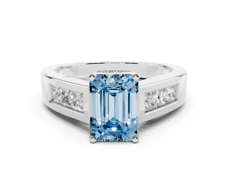 Fancy Blue Emerald Cut Diamond Solitaire Ring Set in White gold with Channel-Set Accent Stones and Prong Setting