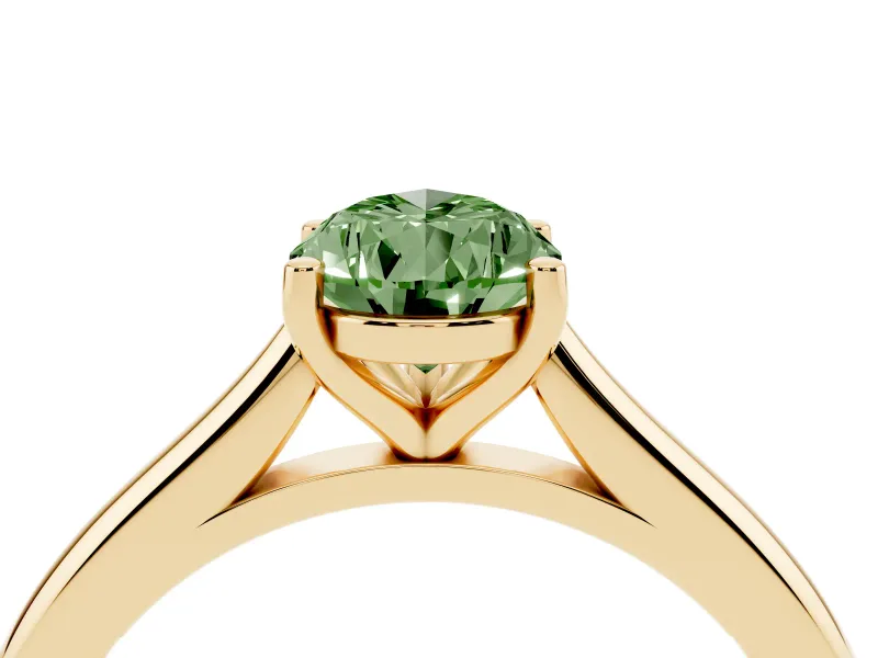 Fancy Green Pear Cut Diamond Solitaire Ring Set in Yellow gold with Cathedral Band and Prong Setting