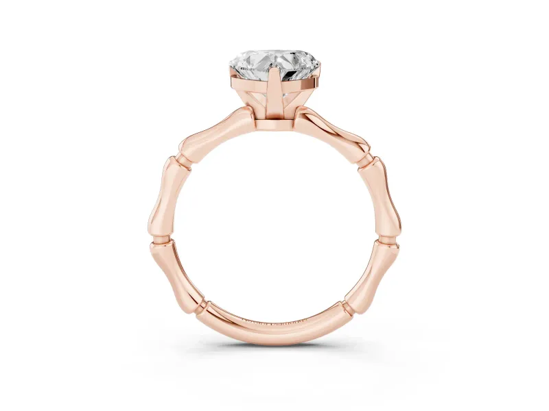 Heart Cut Diamond Solitaire Ring Set in Rose gold with Bamboo Band and Prong Setting