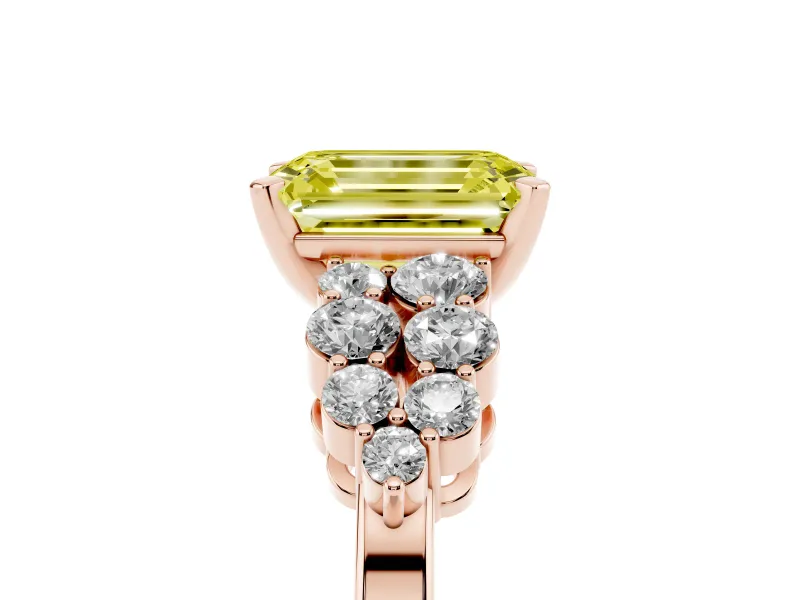 Fancy Yellow Emerald Cut Diamond Cluster Engagement Ring Set in Rose gold with Pavé Band and Prong Setting