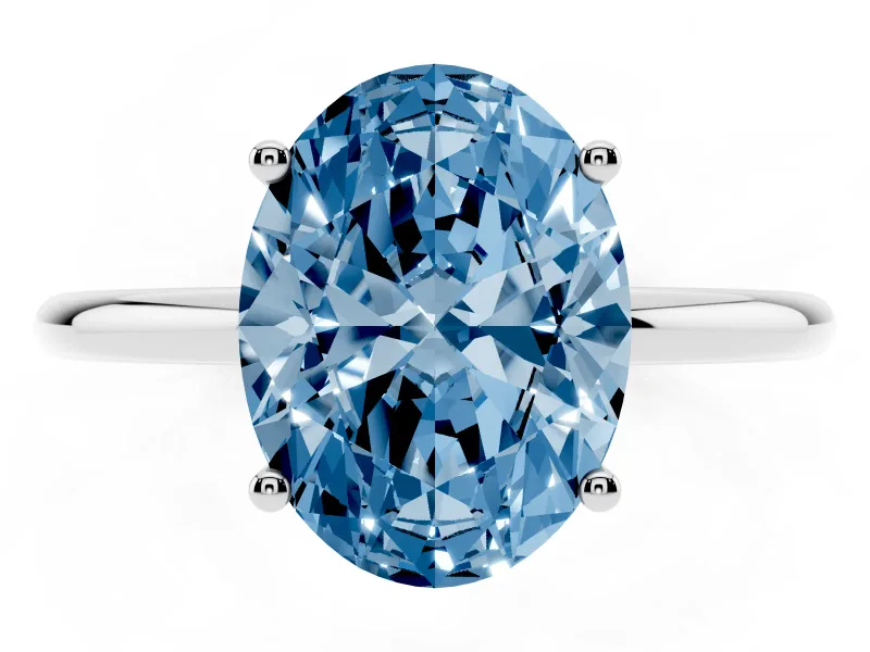 Fancy Blue Oval Cut Diamond Solitaire Engagement Ring Set in Platinum with Thin Band and Prong Setting