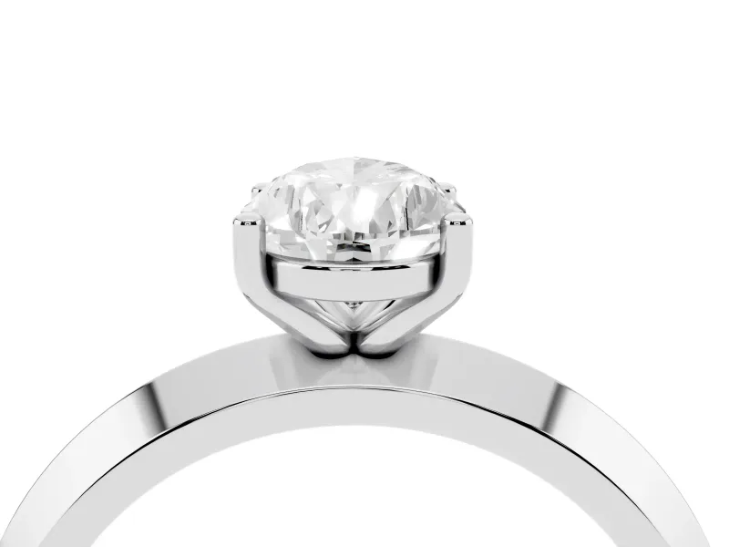 Pear Cut Diamond Solitaire Engagement Ring Set in Platinum with Flat Band and Prong Setting