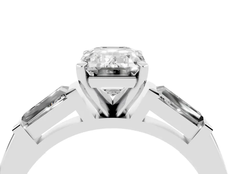 Emerald Cut Diamond Solitaire Ring Set in White gold with Tapered Baguette Side Stones and Prong Setting