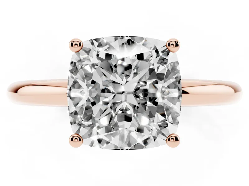 Cushion Cut Diamond Solitaire Engagement Ring Set in Rose gold with Prong Setting and Polished Band