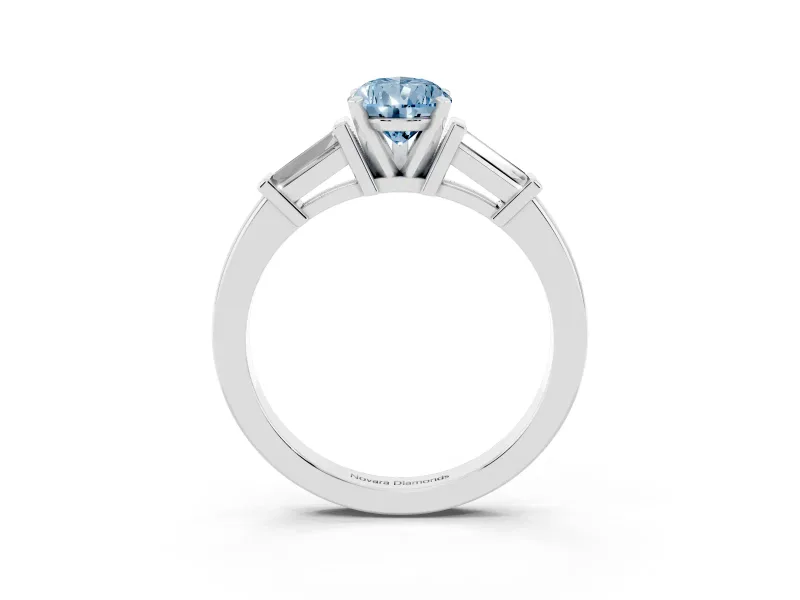 Fancy Blue Pear Cut Diamond Solitaire Ring Set in Silver with Tapered Baguette Accents and Prong Setting