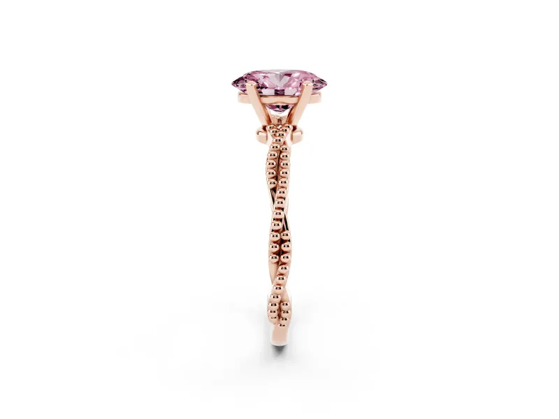 Fancy Pink Oval Cut Diamond Solitaire Ring Set in Rose gold with Twisted Band and Bead Prong Setting
