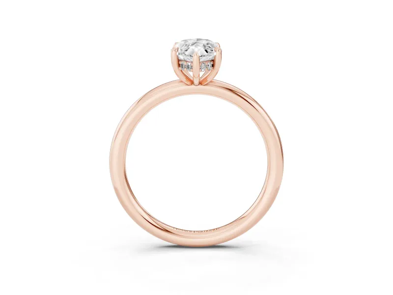 Marquise Cut Diamond Solitaire Ring Set in Rose gold with Thin Band and Prong Setting