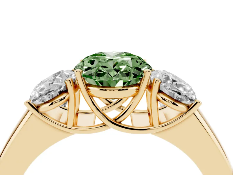 Fancy Green Three-Stone Oval Cut Diamond Ring Set in Yellow gold with Matching Prong Settings and Plain Band