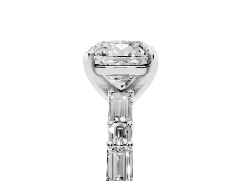Cushion Cut Diamond Solitaire Set in White gold with Side Baguettes and Channel Set Band