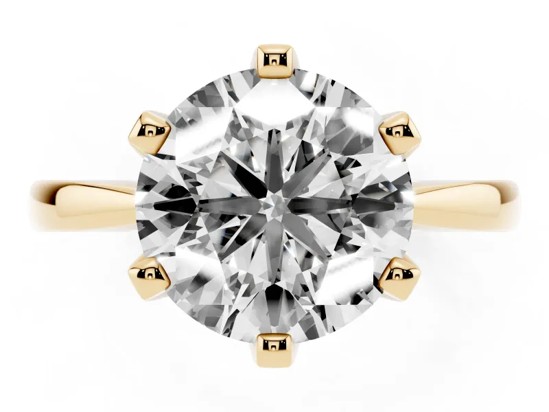 Round Cut Diamond Solitaire Engagement Ring Set in Yellow gold with Slim Tapered Solitaire Band