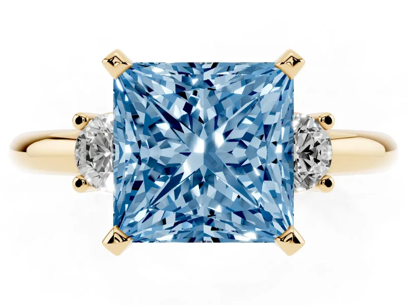 Fancy Blue Three-Stone Princess Cut Diamond Ring Set in Yellow gold with Prong Setting and Plain Band