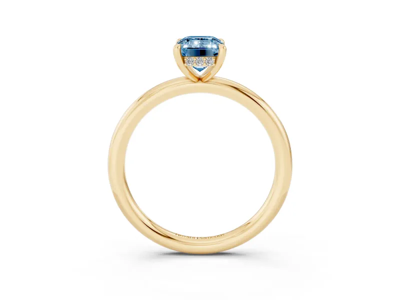 Fancy Blue Emerald Cut Diamond Solitaire Ring Set in Yellow gold with Thin Band and Prong Setting