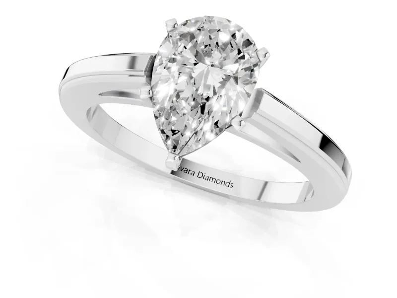 Pear Cut Diamond Solitaire Ring Set in White gold with Prong Setting and Classic Band