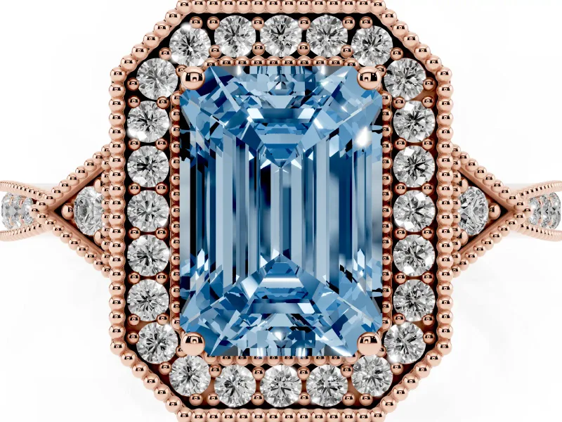 Fancy Blue Emerald Cut Diamond Halo Engagement Ring Set in Rose gold with Milgrain Pavé Band
