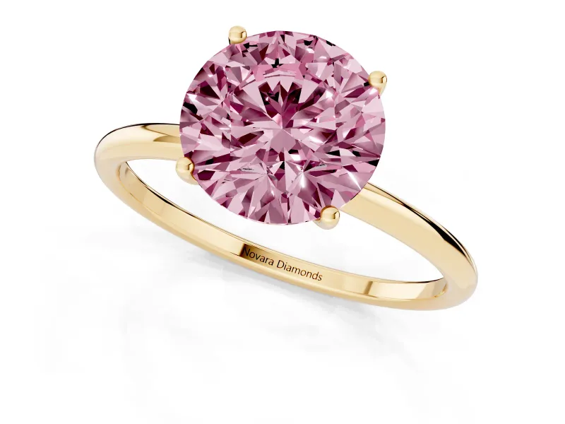 Fancy Pink Round Cut Diamond Solitaire Engagement Ring Set in Yellow gold with Thin Band and Prong Setting