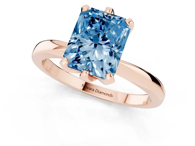 Fancy Blue Radiant Cut Diamond Solitaire Engagement Ring Set in Rose gold with Slim Tapered Solitaire Band