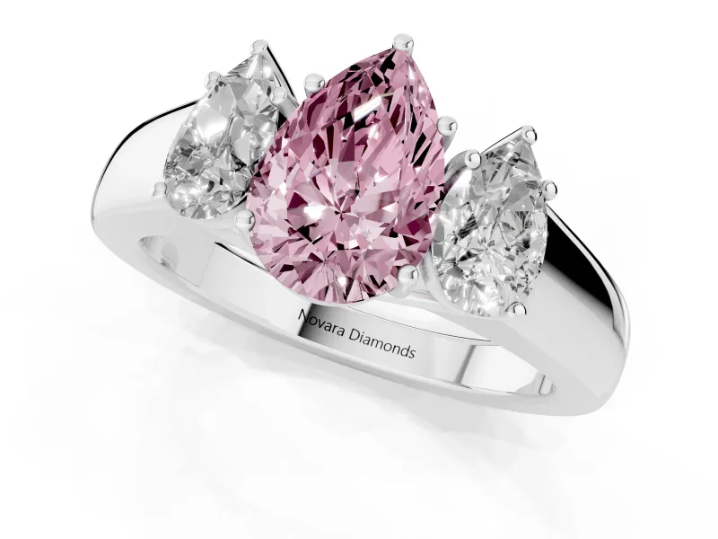 Fancy Pink Three-Stone Pear Cut Diamond Ring Set in Silver with Matching Prong Settings and Plain Band