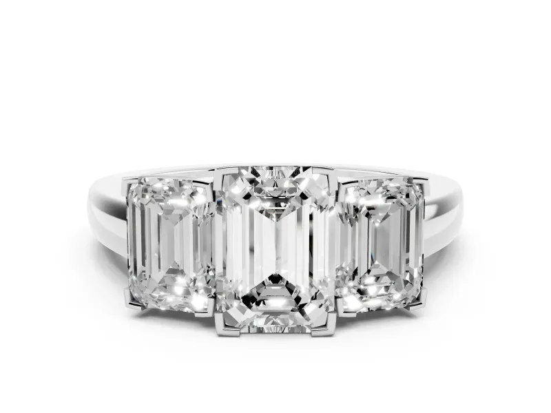 Emerald Cut Diamond Three-Stone Ring Set in White gold with Channel-Set Band and Prong Settings