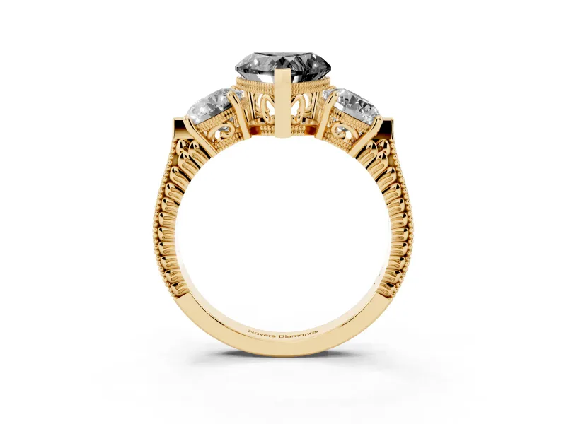 Fancy Black Heart Cut Diamond Three-Stone Ring Set in Yellow gold with Milgrain Band