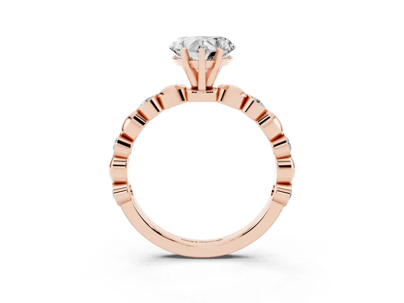 Heart Cut Diamond Solitaire Ring Set in Rose gold with Bezel-Set Accents on Beaded Band and Prong Setting