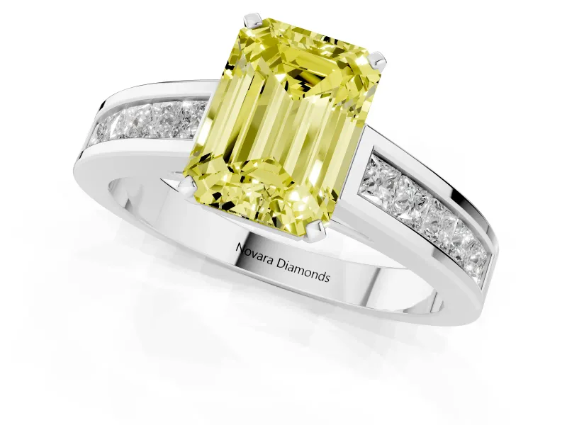 Fancy Yellow Emerald Cut Diamond Solitaire Ring Set in Platinum with Channel-Set Band and Prong Setting