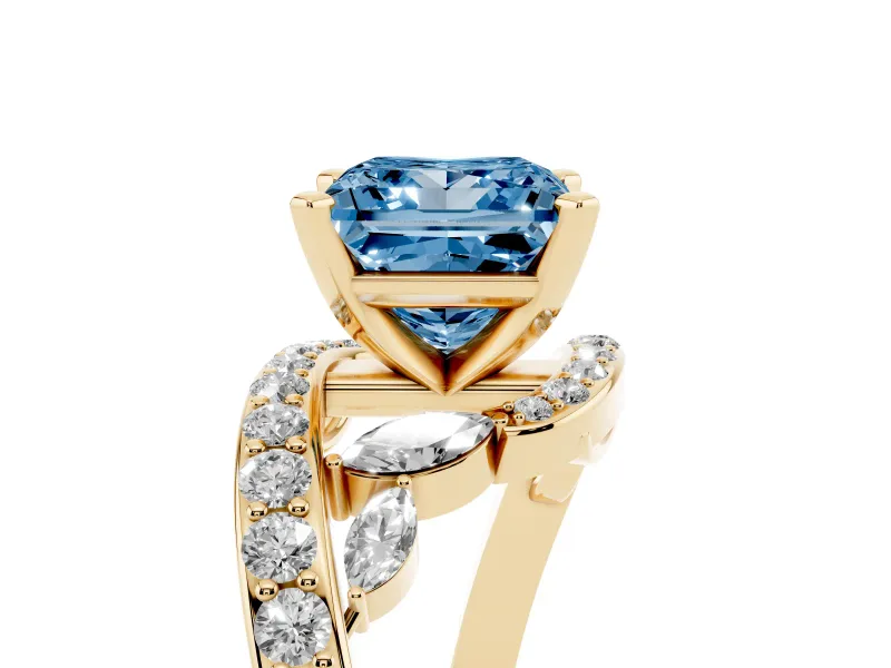 Fancy Blue Princess Cut Diamond Solitaire Ring Set in Yellow gold with Pavé Twist Band and Secure Prong Setting