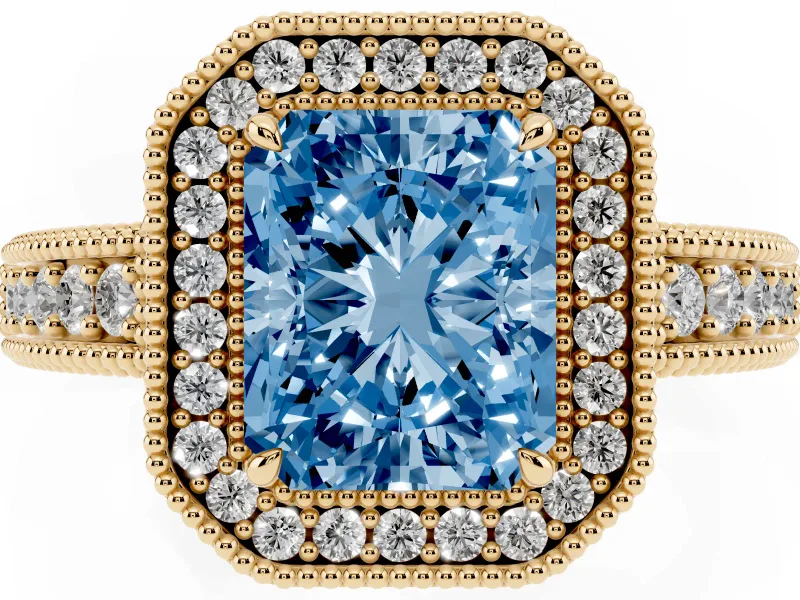 Fancy Blue Radiant Cut Diamond Halo Ring Set in Yellow gold with Round Accent Halo, Pavé Band and Prong Setting