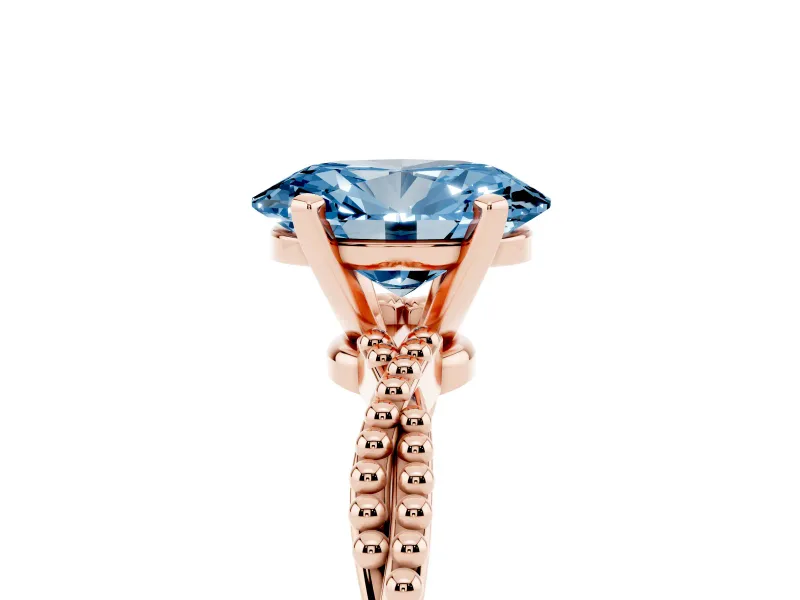 Fancy Blue Oval Cut Diamond Solitaire Ring Set in Rose gold with Twisted Band and Bead Prong Setting