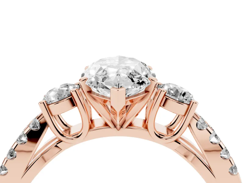 Marquise Cut Diamond Three-Stone Ring Set in Rose gold with Pavé Split Shank and Prong Setting