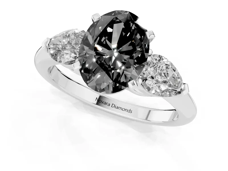 Fancy Black Three-Stone Oval Cut Diamond Ring Set in Silver with Pear Side Stones and Prong Setting