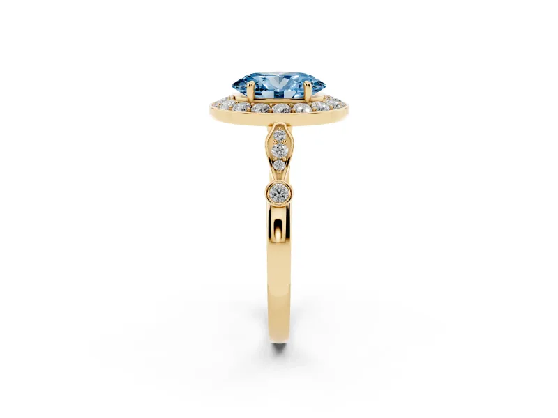 Oval Halo Engagement Ring Setting for a Fancy Blue Lab-Grown Diamond | Bezel Stations | Yellow Gold