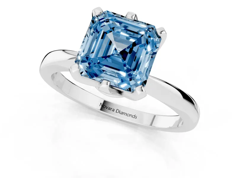 Fancy Blue Asscher Cut Diamond Solitaire Engagement Ring Set in White gold with Slim Tapered Solitaire Band