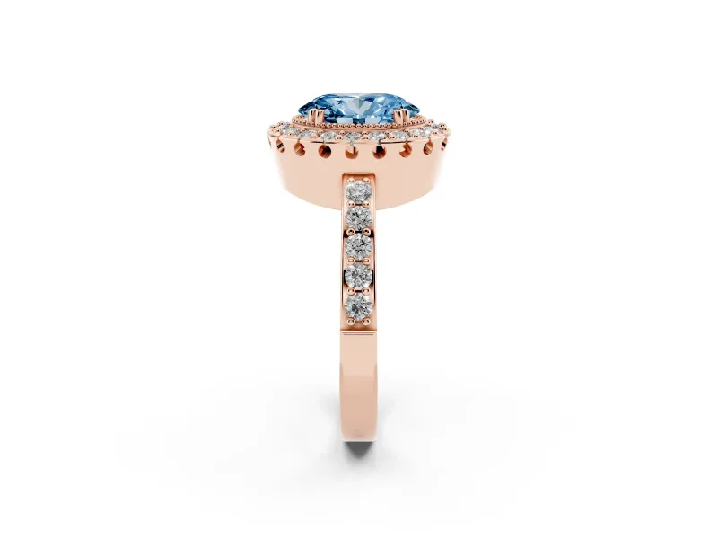 Fancy Blue Oval Cut Diamond Halo Ring Set in Rose gold with Pavé Shank and Prong Setting