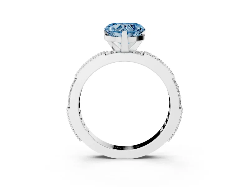 Fancy Blue Heart Cut Diamond Solitaire Ring Set in White gold with Slim Pavé Band and Prong Setting